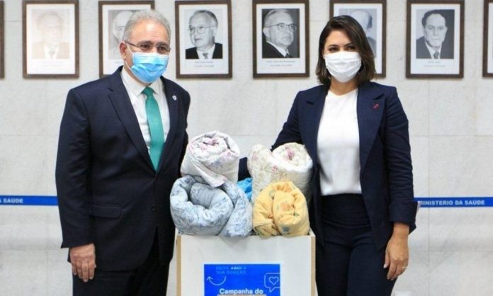 O ministro da Saúde, Marcelo Queiroga e a Primeira-Dama, Michelle Bolsonaro.